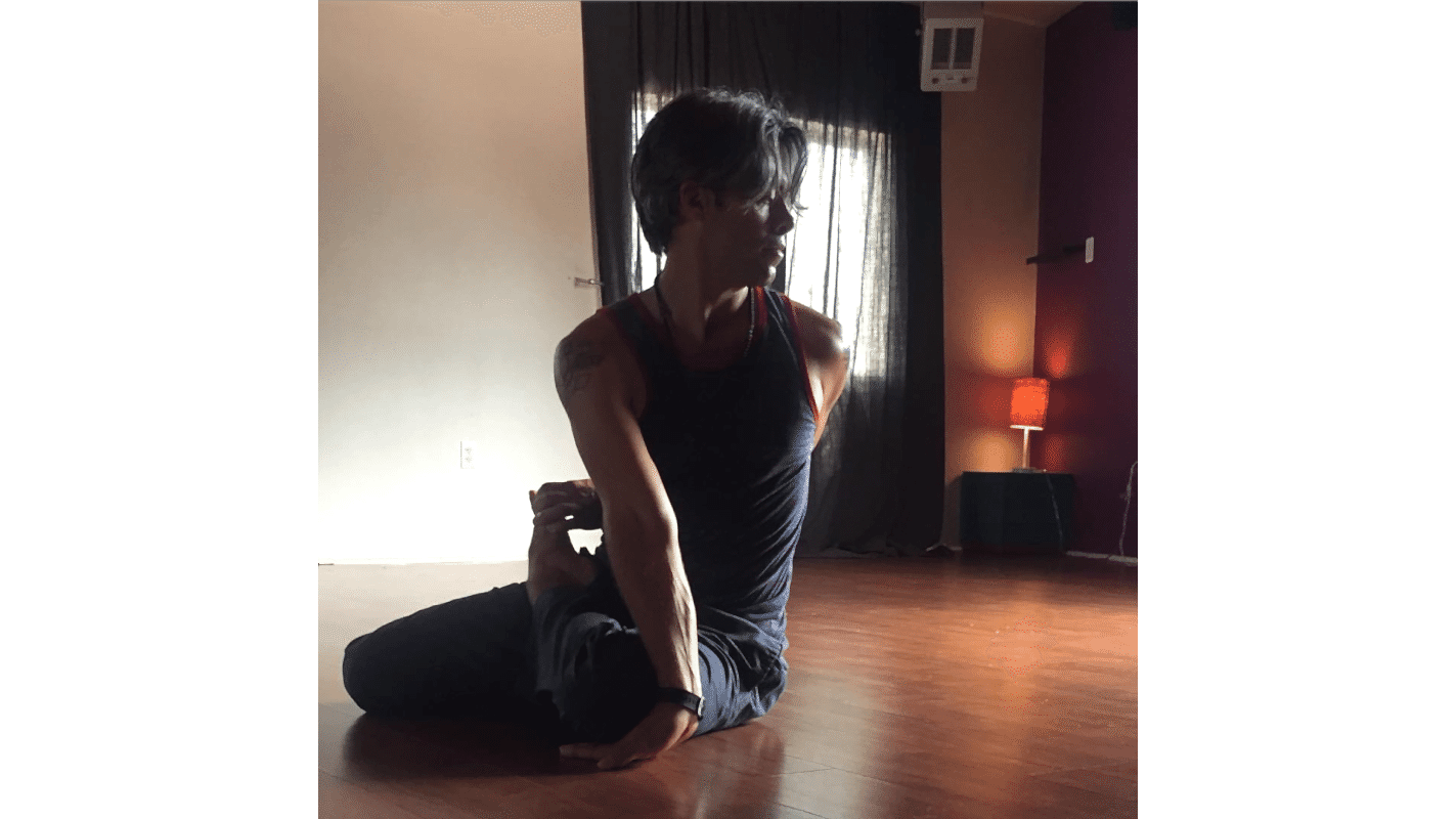 Photo of Austin in yoga pose