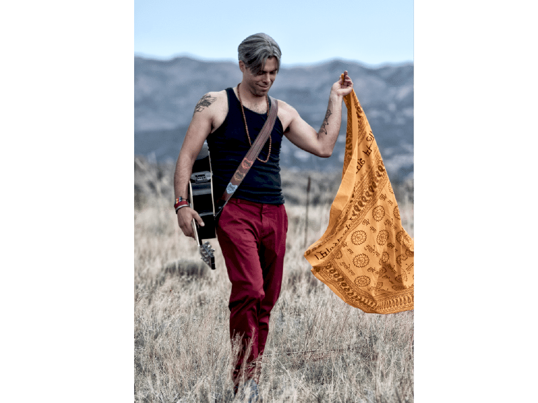 Photo of Austin in a field