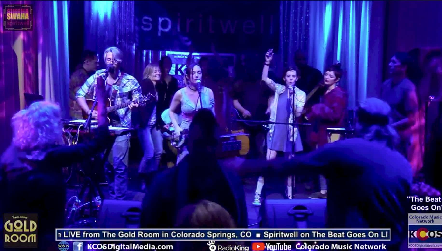 People dancing with the band at the Gold Room